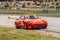 Exit of track of a Porsche 934 recovering the trajectory on gravel and earth