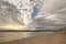 Exmouth, devon: low tide, beach and sunset. Cloudscape horizon