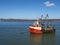 EXMOUTH, DEVON, UK - SEPTEMBER 20, 2019: Commercial fishing vessel moored in the Exe river estuary. Local industry