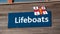 Exmouth, UK - August 03 2020: RNLI Lifeboats sign on the Lifeboat station on the seafront