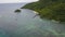 Exotic aerial view of turquoise water with wooden jetty on Flores island Indonesia