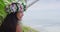 Exotic beauty wellness woman relaxing on tropical beach in Tahiti flower wreath