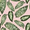 Exotic beige bright green leaves seamless pattern on pink background.