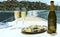 Exotic country voyage. Champagne bottle and flutes glasses on deck of luxury cruise ship during honeymoon holidays. Love