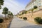 Exotic European style buildings on roadside ramp in sunny winter