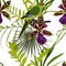 Exotic flowers seamless pattern. Tropical violet green orchid flowers, green parrot and palm leaves in summer print.