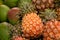 Exotic fruits, fresh ripe sweet pinapples and mango, tropical food background