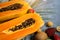 Exotic fruits, papaya on table