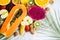 Exotic fruits and tropical leaves on table