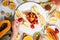 Exotic fruits and tropical leaves on table