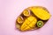 Exotic fruits on wooden cutting board