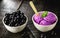 Exotic jabuticaba ice cream, purple color. Dessert served in biodegradable plastic bowl