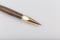 Exotic, Luxury Iroko wood bolt-action pen with chrome metal fixtures and beautiful knot in the wood - Product Photo