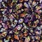 Exotic multicoloured boho floral camouflage scatter print. Seamless autumnal dark ground detailed repeat pattern.