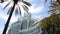 Exotic palm trees frame exterior of Anaheim Convention Center