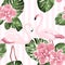 Exotic pink flamingo birds couple. Bright camelia flowers. Tropical monstera green leaves. Trendy seamless pattern.