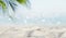 Exotic sandy beach with blurred summer sea on the background