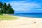 Exotic sandy beach view during sunny hot day in Polynesia, Manase beach fales