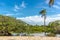 Exotic scenario with palm trees, rivers and white sand in a blue sky day. Exotic destination in north Brazil, South America.