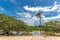 Exotic scenario with palm trees, rivers and white sand in a blue sky day. Exotic destination in north Brazil, South America.