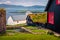 Exotic summer view of Kirkjubour village with turf-top houses, Faroe Islands,  Denmark, Europe. Stunning  morning scene of Hestur