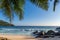 Exotic Tropical beach at sunset and coconut palms on Seychelles.