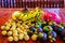 Exotic tropical fruits on wooden background, healthy food, vegetarian diet