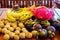 Exotic tropical fruits on wooden background, healthy food, vegetarian diet