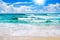 Exotic tropical paradise island beach, turquoise sea water, ocean waves, sand, sun, blue sky white clouds, beautiful tropic nature