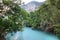 Exotic turquoise blue pool in tropical canyon jungle