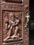 Exotic Wood carving detail Upclose with beautiful metal mermaid door handle