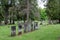 Expansive lawns with hundreds of weathered headstones, Oakwood Cemetery, New York, 2019