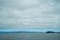 Expansive view of the Columbia River as seen from Astoria, Oregon, with ships and boats in the water