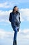 Expect more from your clothes. Woman enjoy weather outdoors. Beauty and fashion. Woman on blue sky background. Winter