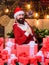 Expectancy is atmosphere for miracles. Give big cheer for New Year. Bearded Santa Claus. Cheerful Santa with gifts