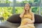 Expectant mom finds joy in her pregnancy, listening to soothing music for a serene and harmonious connection with her