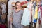 Expectant mother In striped tunic shopping Dress in for babies