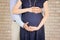 Expectant Parents Embrace Baby Bump