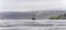 Expedition ship standing in the bay off South Georgia Leith Harbour - old, and largest of all 7 whaling stations on South Georgia.