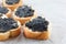 Expensive delicious black caviar white bread sandwich snack on w