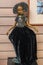 Expensive designer figurine girl in a dress in a restaurant interior of the yacht club Burevestnik