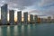 Expensive highrise hotels and condos over sandy beachfront on Atlantic ocean shore in Sunny Isles Beach city at sunset