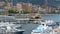 Expensive yacht with helipad docked in Monaco harbor, luxury private property