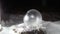 Experience in cold weather in winter -50 degrees Celsius. Soap Bubble, Frozen bubble with ice crystals at night. Turkey travel, Er