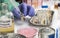 Experienced laboratory scientist analyzing a sample from a canned food can, botulism infection in sick people