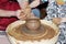 experienced master potter teaches the art of making pots clay on the\'s wheel