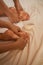 Experienced reflexologists giving their patient Thai foot massage