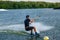 Experienced wakeboarder demonstrating freeride skills maneuvering between buoys