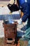 An experienced welder at work. Preparation and welding process of cast iron furnace. Selection focus. Shallow depth of field