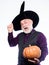 Experienced and wise. Halloween tradition. Cosplay outfit. Senior man white beard celebrate Halloween with pumpkin